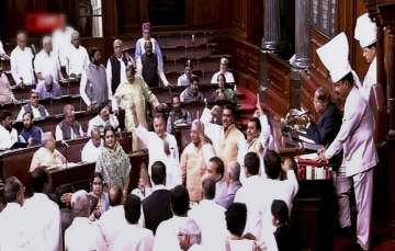 Opposition members protest in Rajya Sabha over alleged EVM tampering 