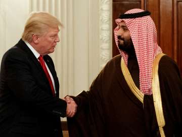 File pic - Trump shakes hands with Saudi Deputy Crown Prince Mohammed bin Salman