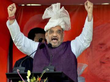 BJP President Amit Shah addressing a public meeting in Kumarghat