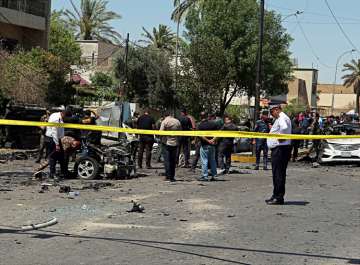 Bomb blast in Baghdad kills 13, hurts 24