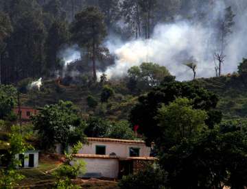 Smoke after a mortar shell was fired by Pakistan Army along the LoC on Saturday
