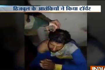 Video shows suspected Hizbul militants torturing, shaving head of J&K cop 