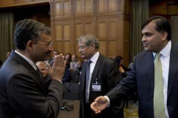 Dr. Deepak Mittal, joint secretary of MEA, greeting a member of Pak delegation