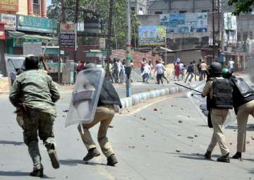 Police and RAF personnel trying to stop violent protest in Jamshedpur