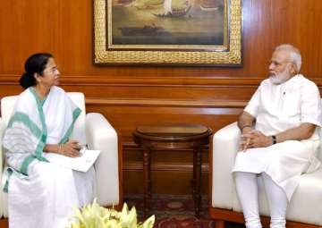 PM Modi with WB CM Mamata Banerjee in New Delhi on Thursday