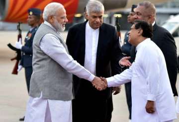 PM Modi received by his Sri Lankan counterpart Ranil Wickremesinghe in Colombo