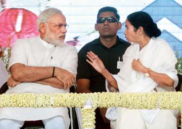 File pic of PM Modi and Mamata Banerjee at an event 