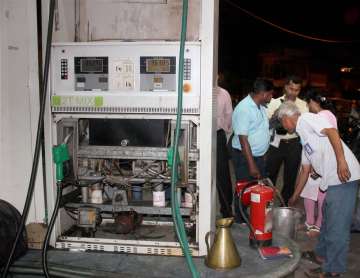 STF personnel inspect a petrol pump in old city area of Lucknow on Sunday