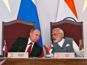 File pic of Russian President Putin and Indian PM Modi 