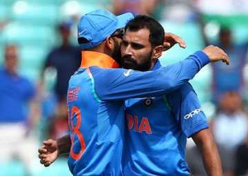 Virat, Shami shine as India beat New Zealand
