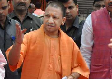 Yogi Adityanath arrives at circuit house for a meeting in Moradabad on Sunday