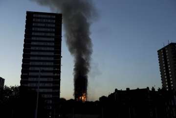 At least 6 dead as massive fire engulfs London's Grenfell Tower, several injured