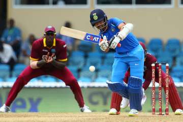 Ajinkya Rahane of India plays the ball during the match