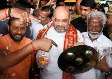 Amit Shah with Kerala BJP president Kummanam Rajasekharan in Thiruvananthapuram