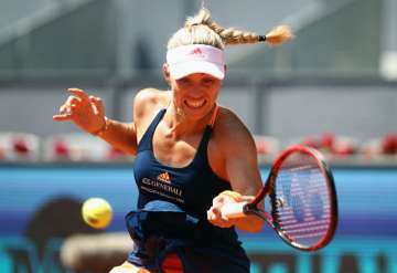 Angelique Kerber of Germany plays a forehand in her match