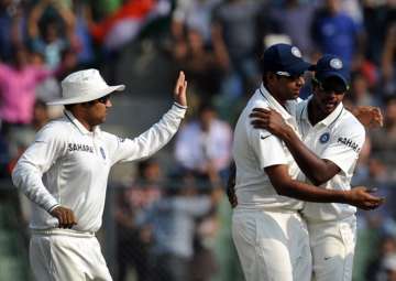 A file image of Virender Sehwag, R Ashwin and Varun Aaron.