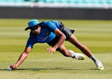 R Ashwin takes a catch during a net session.