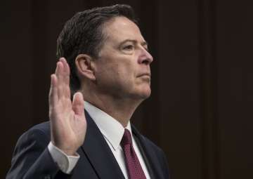 Comey is sworn in before Senate Select Committee on Intelligence on Capitol Hill