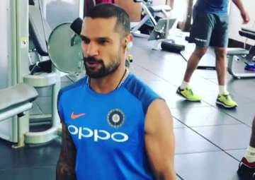 Shikhar Dhawan works out in the gym.