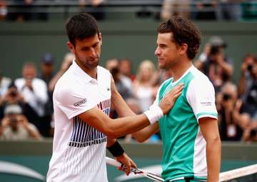 Novak Djokovic reacts after losing in French Open quarter-finals.