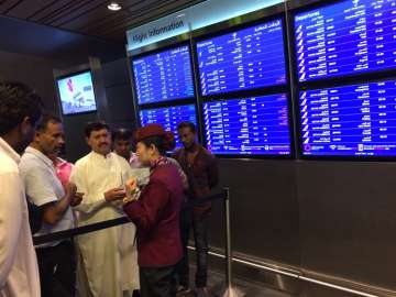 Passengers of cancelled flights wait at Dohar Airport 