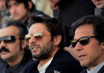 A file image of Imran Khan and Shahid Afridi.