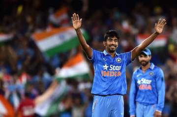 Jasprit Bumrah of India reacts after taking the wicket