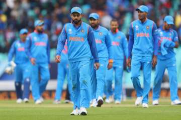  Virat Kohli of India leads the team off the field after loss vs Sri Lanka