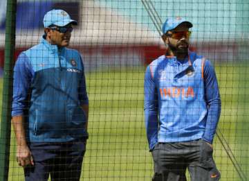 Anil Kumble and Virat Kohli during nets session