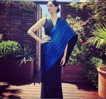 Denim Saree - The Indian traditional dress by Masaba Gupta | Bollywood  celebrities, Fashion, Indian fashion