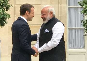 PM Modi meets French President Emmanuel Macron in Paris