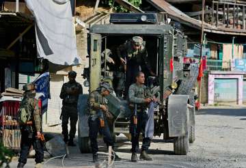Six policemen, two civilians and one militant were killed in Kashmir on Friday