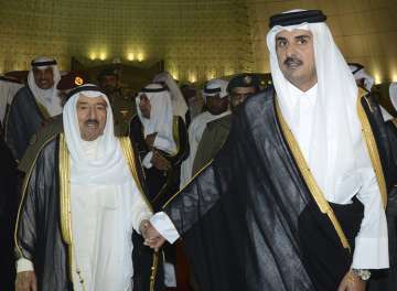 Kuwait's Emir Sheikh Sabah Al Ahmad Al Sabah with Qatar's Emir 