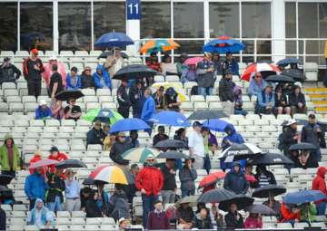 Spectators waiting for the rain to end in Birmingham during AUS vs NZ clash.