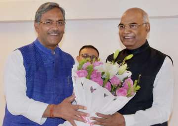 Trivendra Rawat greets Ram Nath Kovind on his arrival in Dehradun