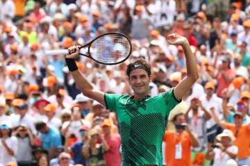 Roger Federer of Switzerland celebrates match point