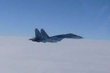 Russia said its Su-27 fighter jet intercepted an American bomber near its border