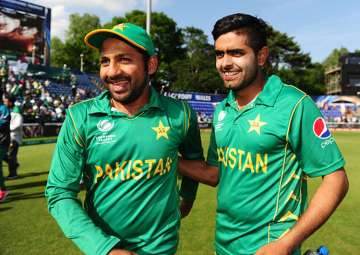Sarfraz Ahmed celebrates with Babar Azam after Pakistan's victory over England.