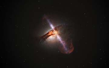 Astronomers discover orbiting supermassive black holes