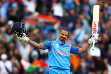 Shikhar Dhawan of India celebrates his century during the ICC Champions trophy 