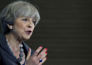 Britain's PM and Conservative party leader Theresa May delivers a speech