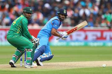 Virat Kohli of India plays a shot behind point