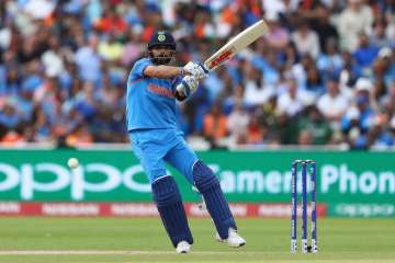 Virat Kohli of India pulls a delivery to the legside