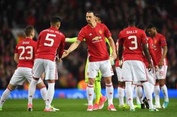  Zlatan Ibrahimovic and Marcos Rojo of Manchester United shake hands