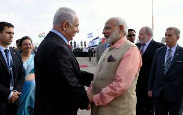 PM Modi being seen off by Netanyahu as he emplanes for Hamburg
