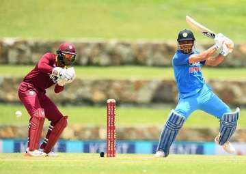 MS Dhoni plays a shot against West Indies.