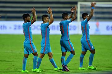 Indian team players along with their captain Sunil Chhetri 2-L celebrate victory