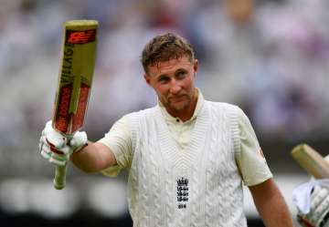 Joe Root of England acknowledges the crowd as he leaves the field