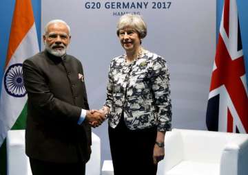 PM Modi meets Theresa May in Germany 