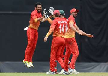 Sikandar Raza celebrates a wicket.
